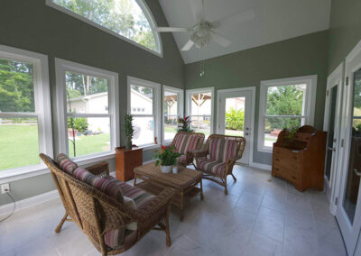 Interior view of the final sunroom project with furnishings
