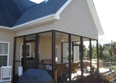 outside view of the original screened porch before being remodeled into a year-round sunroom