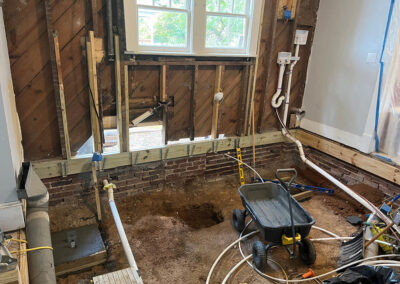 Kitchen wall removed to facilitate repairs in this Winston-Salem 1920s bungalow