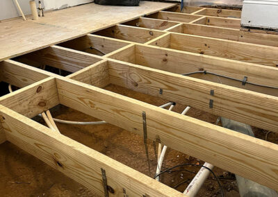 Joists are in and services have been reattached to them (pipes, electrical, HVAC)