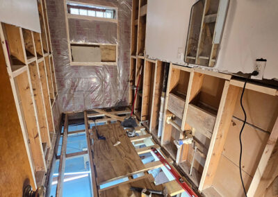temporary boards create a pathway for workers to move about the space without falling through the floor